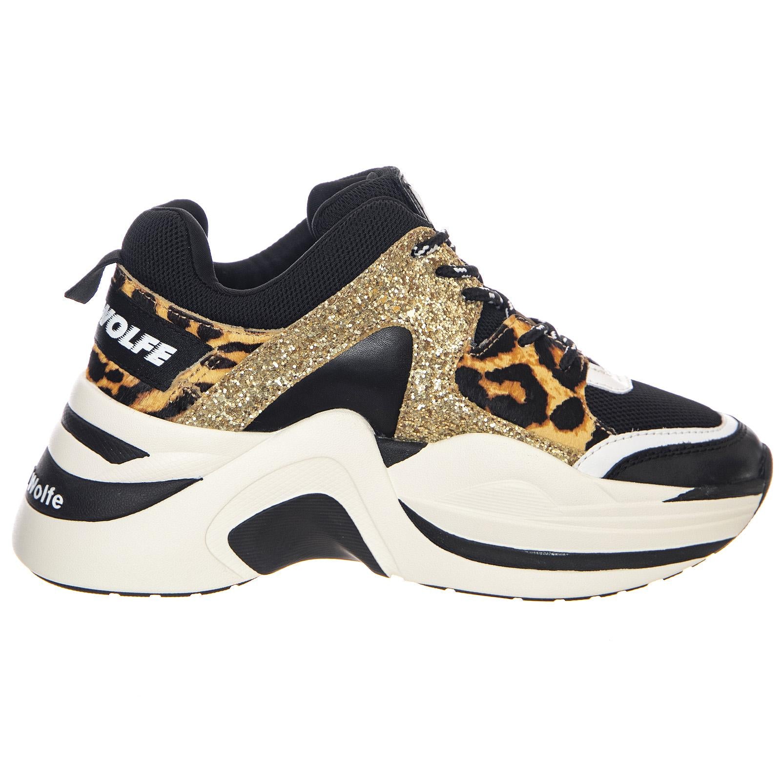  NWSTRACK-GOLDGL  NAKED WOLFE 